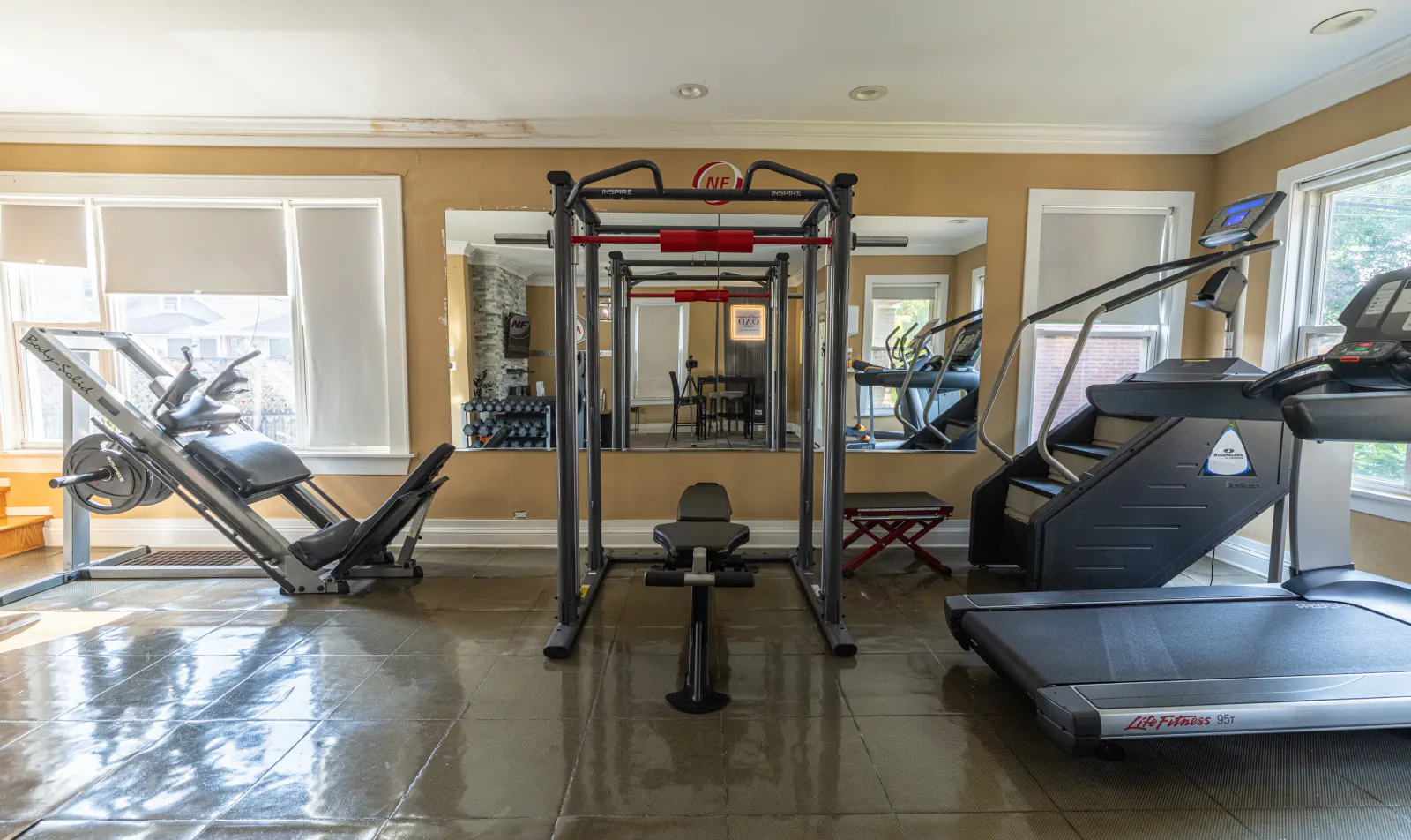 Private Overall Development gym with cable station, incline machine and treadmill