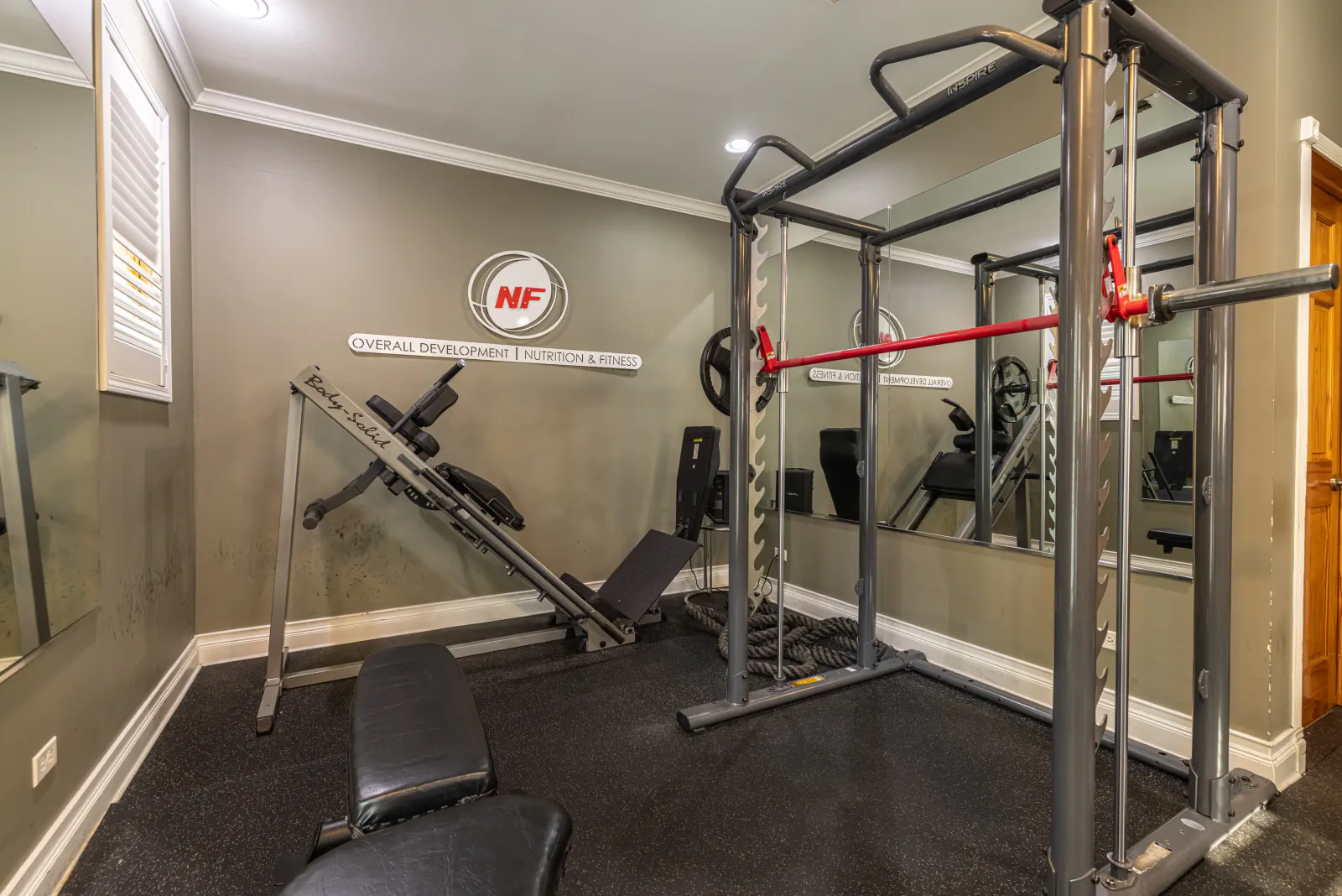 Strength rack and adjustable bench in the Overall Development gym